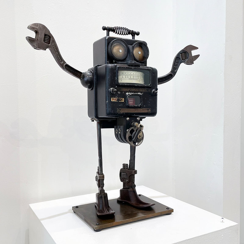 sculpture character composed of dials and other repurposed components