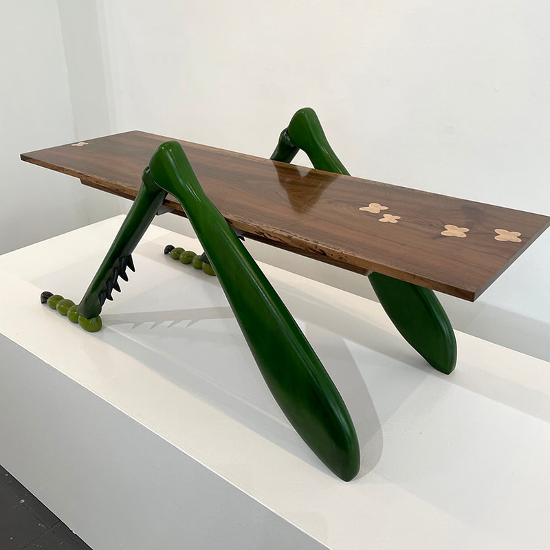 coffee table with grasshopper legs