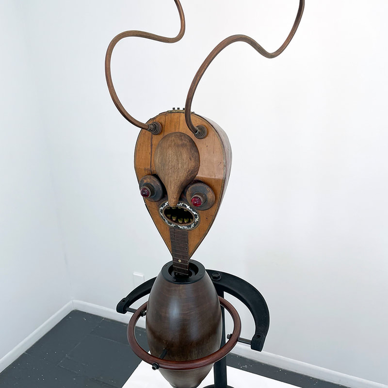 Sculptural figure made of musical instruments
