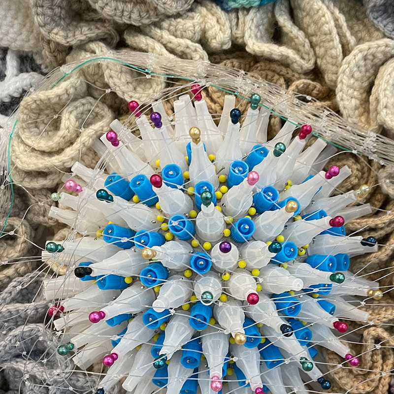 Plastic parts assembed in a sculpture