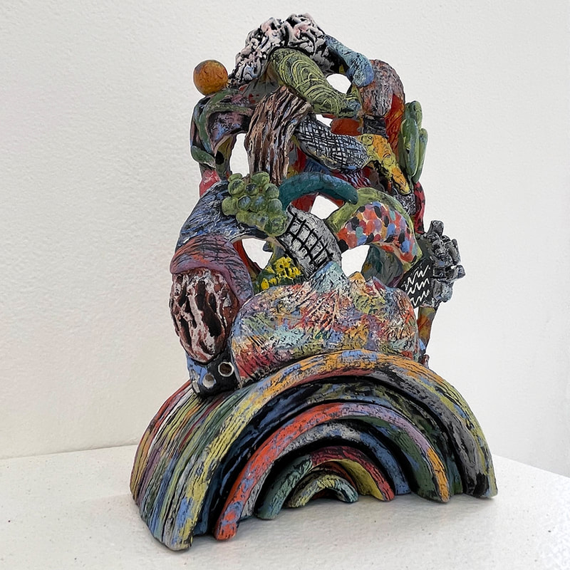 Rainbow motif ceramic sculpture